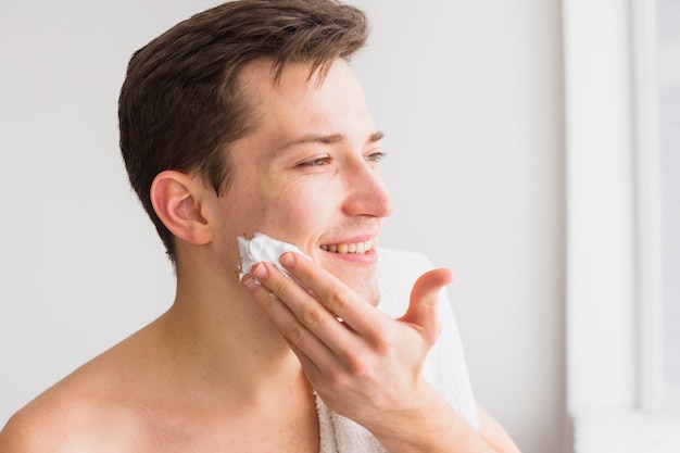 Shaving concept with attractive man