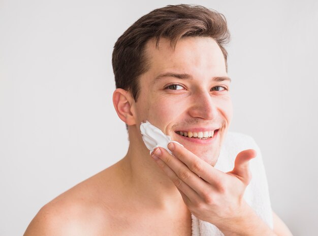 Shaving concept with attractive man