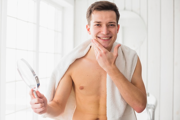 Free photo shaving concept with attractive young man