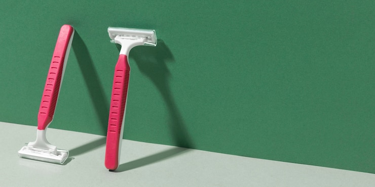 Free Photo shaving razors for body care copy space