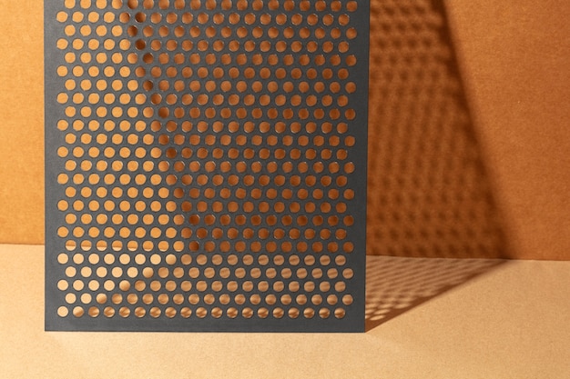 Sheet of perforated material with tiny holes