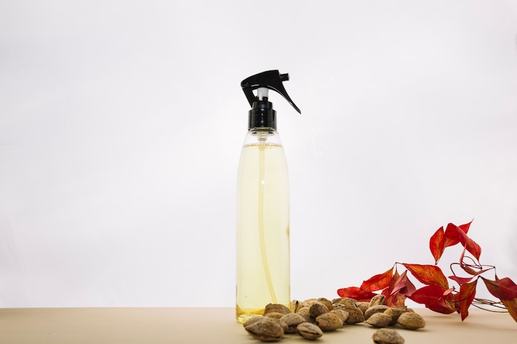 Free Photo shelled almond near skincare product