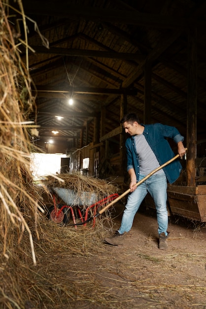 Free photo shepherd with pitchfork full shot