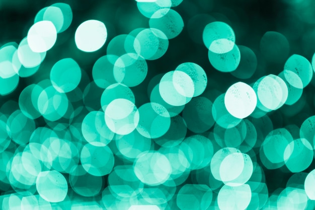 Free photo shinning green bokeh background