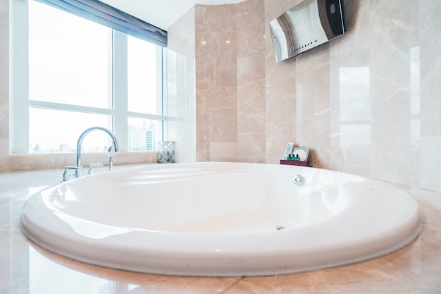 Shiny bathroom with a big bathtub