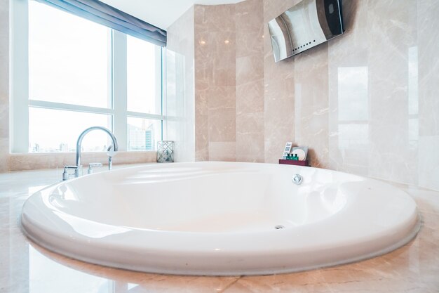 Shiny bathroom with a big bathtub