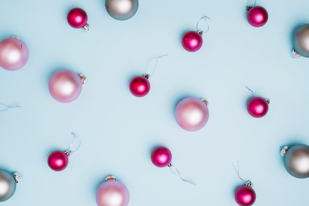 Shiny baubles on blue table