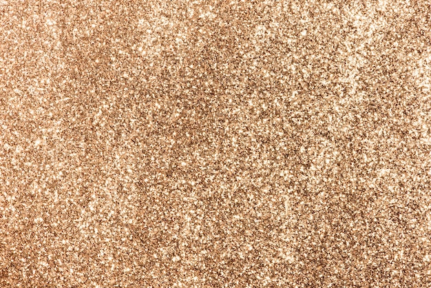 Free photo shiny copper glitter festive background