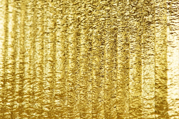 Shiny gold textured paper background