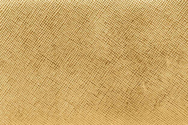 光沢のあるゴールドの織り目加工の紙の背景