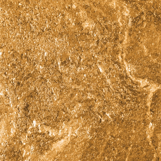 光沢のあるゴールドの織り目加工紙の背景