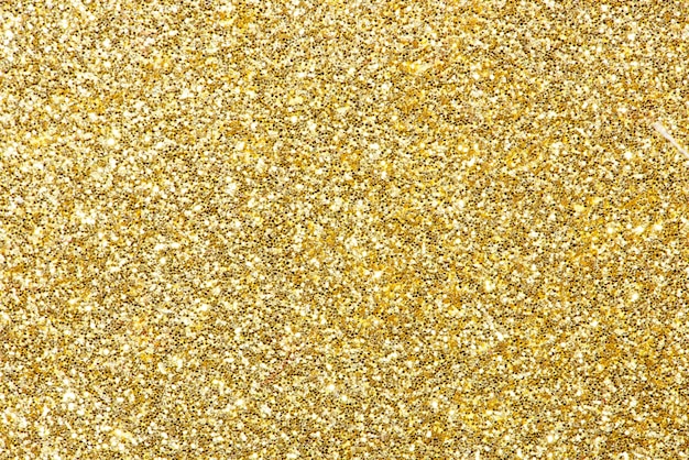Shiny golden glitter festive background