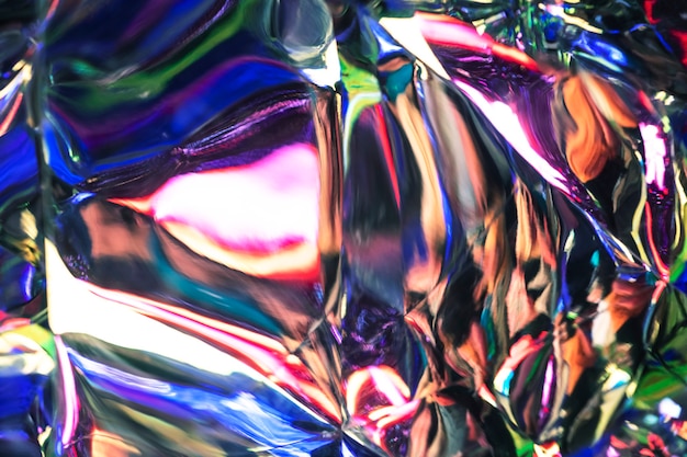 Бесплатное фото Блестящий голографический алюминиевый текстурированный фон