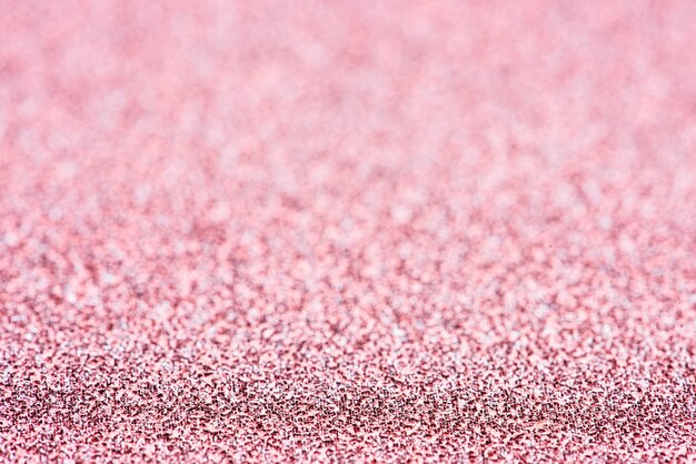光沢のあるピンクのキラキラお祭りの背景