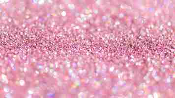 Free photo shiny pink glitter textured background