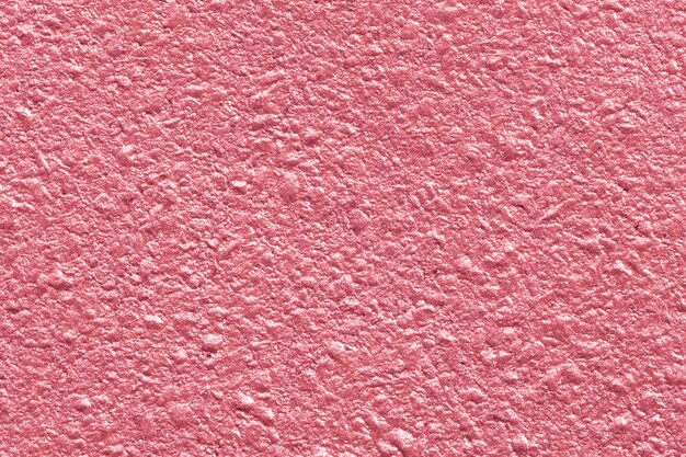 Shiny pink textured paper background