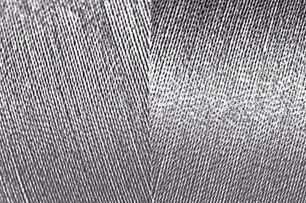 Shiny silver thread textured background