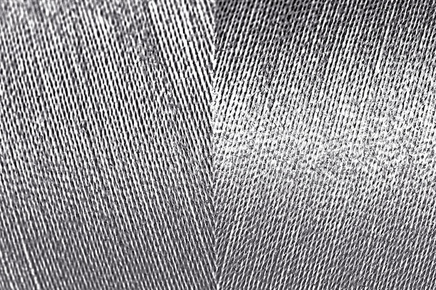 Shiny silver thread textured background