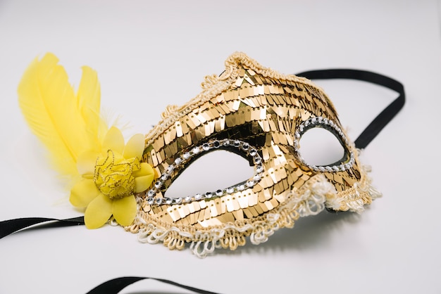 Shiny trendy mask with golden sequins