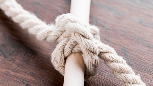 Free photo ship white ropes knot tied on a bar