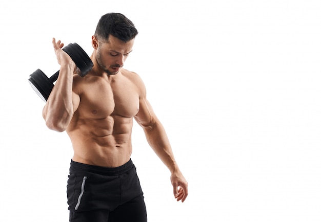 Free photo shirtless bodybuilder holding dumbbell on shoulder.