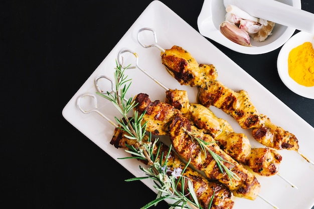 Shish kebab and rosemary on plate