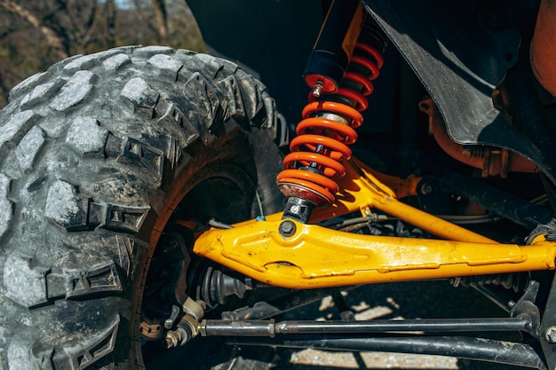 Shock absorber of atv car close up