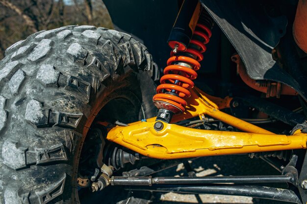 Shock absorber of atv car close up