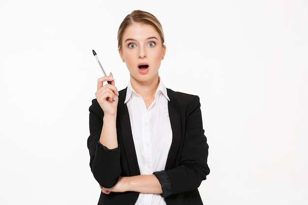 Shocked blonde business woman having idea and  over white wall