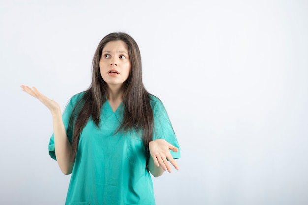 Shocked and scared young nurse