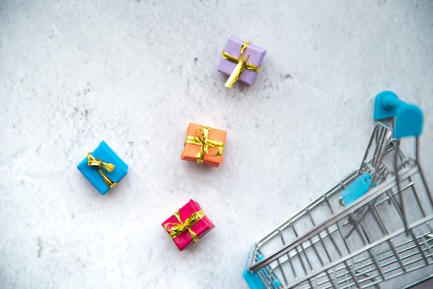 Shopping cart miniature with mini presents
