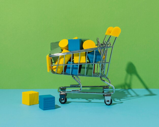 Shopping cart with cube and cylinder