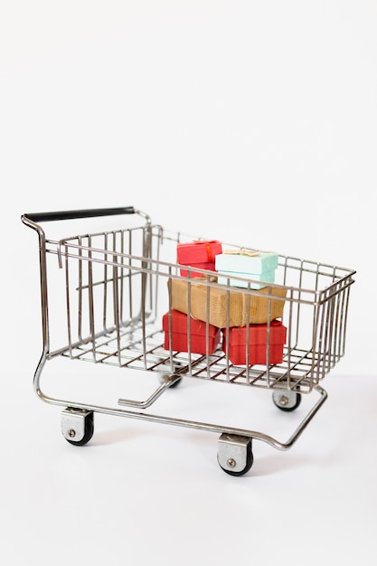 Free photo shopping cart with gifts in it