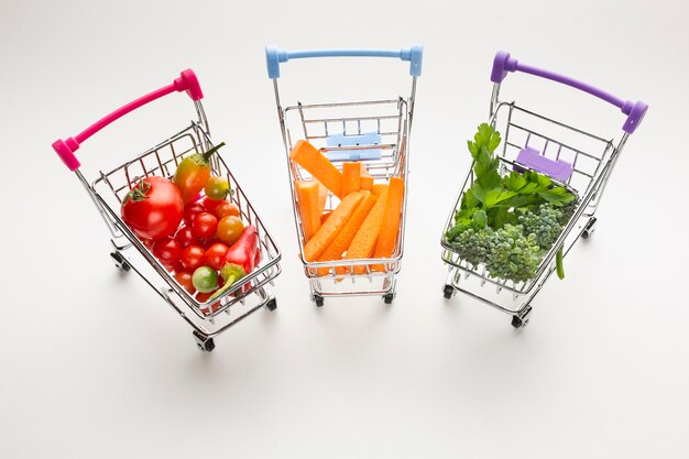 Shopping carts with delicious veggies