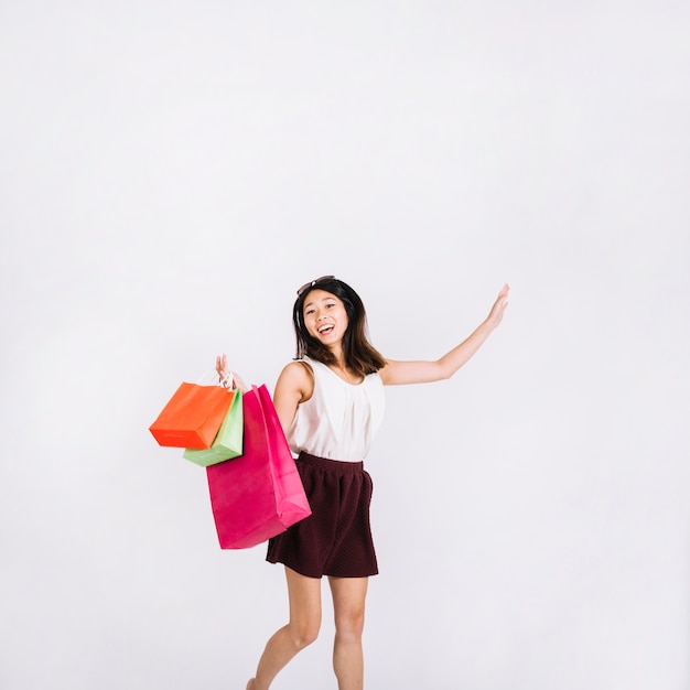 Shopping concept with dancing woman