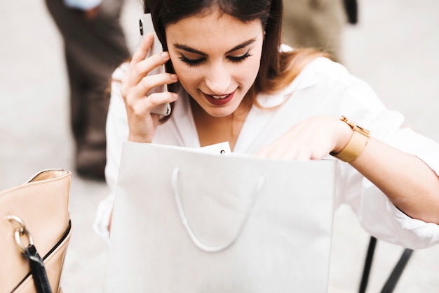 Shopping girl on phone