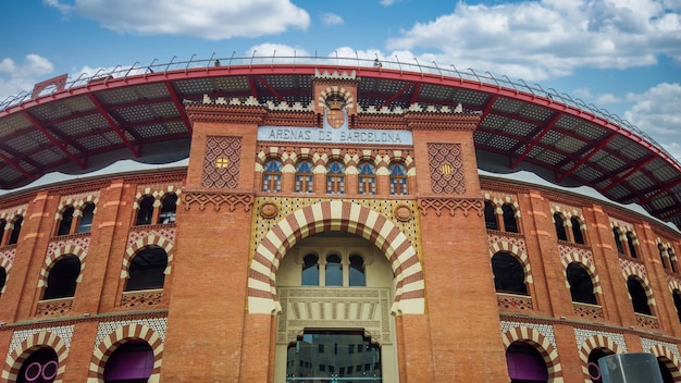 Shopping mall Arenas de Barcelona entrance cloudy sky