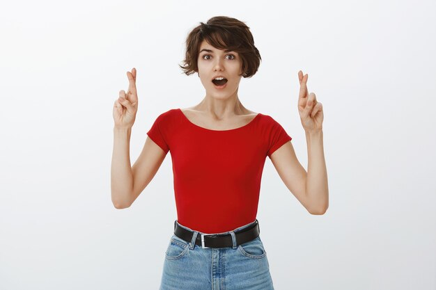 Short hair girl posing in red tshirt