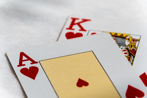 shot of the Ace and King of hearts on top of each other