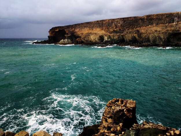 Shot of the beach during stormy weather in Ajuy, Spain