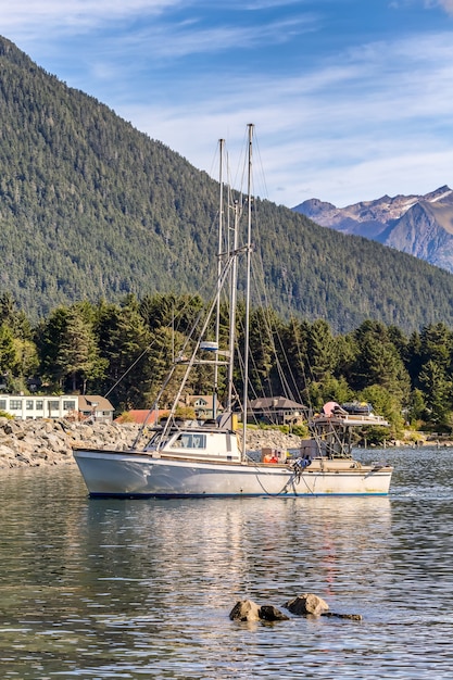 Shot of a fishing boat sailing in harbour in Sitka