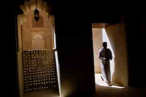 Free photo shot of a human entering inside the karnak temple complex