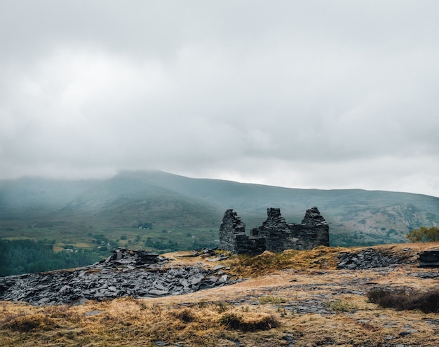 Shot of the ruins of a building on the top of the hill