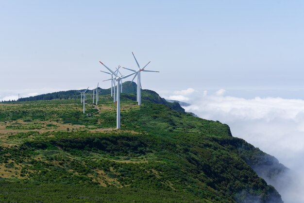 Free Photo shot of wind turbines on the mountains