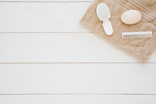 Shower accessories on white table