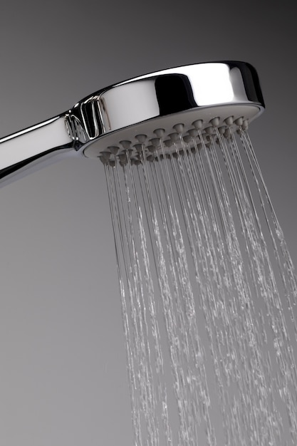 Free photo shower head with hot water