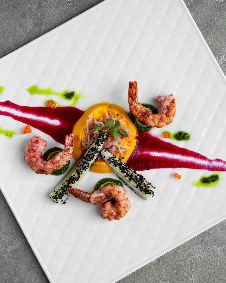 Free Photo shrimps corn and lemon in the plate