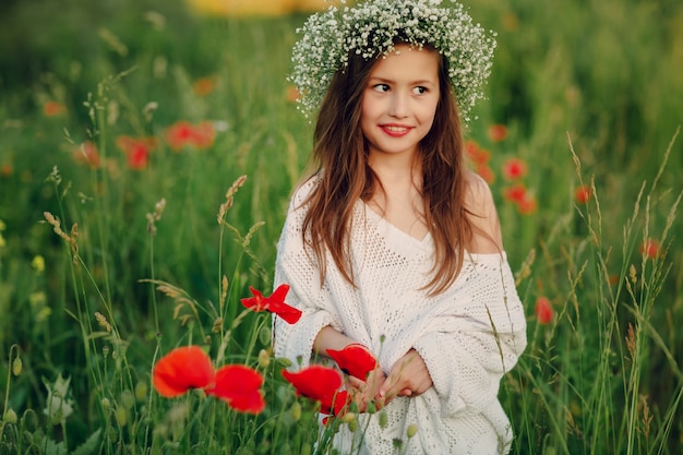 Shy little girl in the meadow