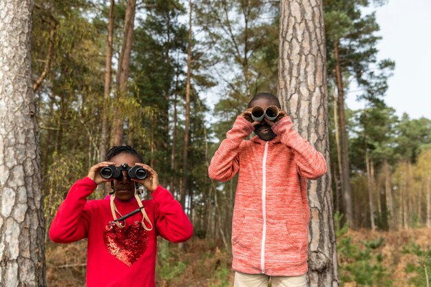 Siblings having fun together outdoors