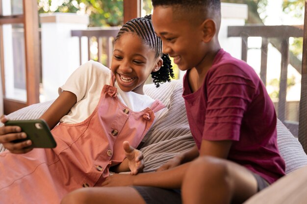 Siblings having fun together